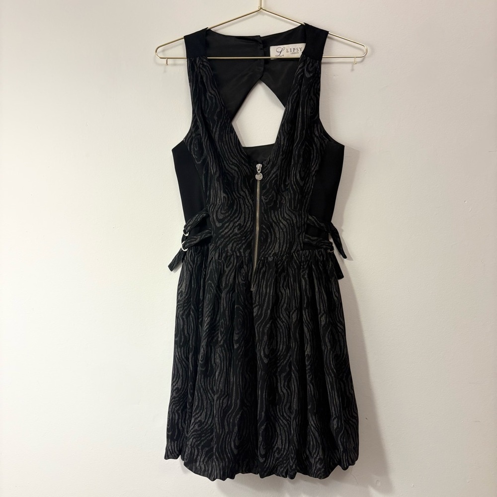 Lipsy Black sleeveless dress with zipper in the front, hooks, buttons, size 6